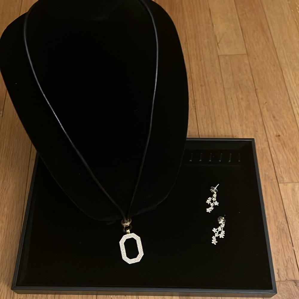 Costume necklace, and earrings with faux diamonds.